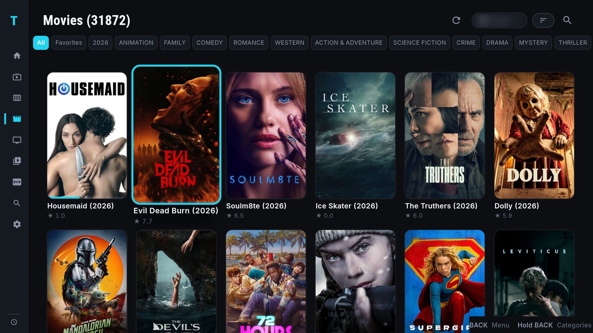 Movies grid with poster artwork and genre filters