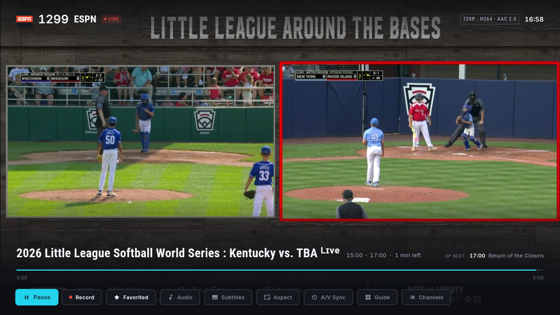 Live playback with the player controls open — pause, record, favorite, audio, subtitles, guide